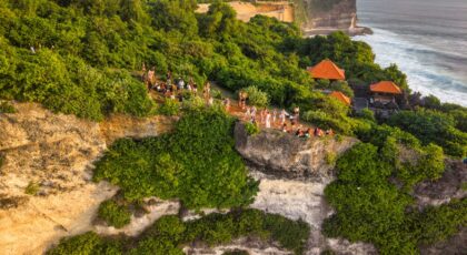 Breathtaking aerial view of Uluwatu Cliffs with lush greenery and coastal views in Bali.